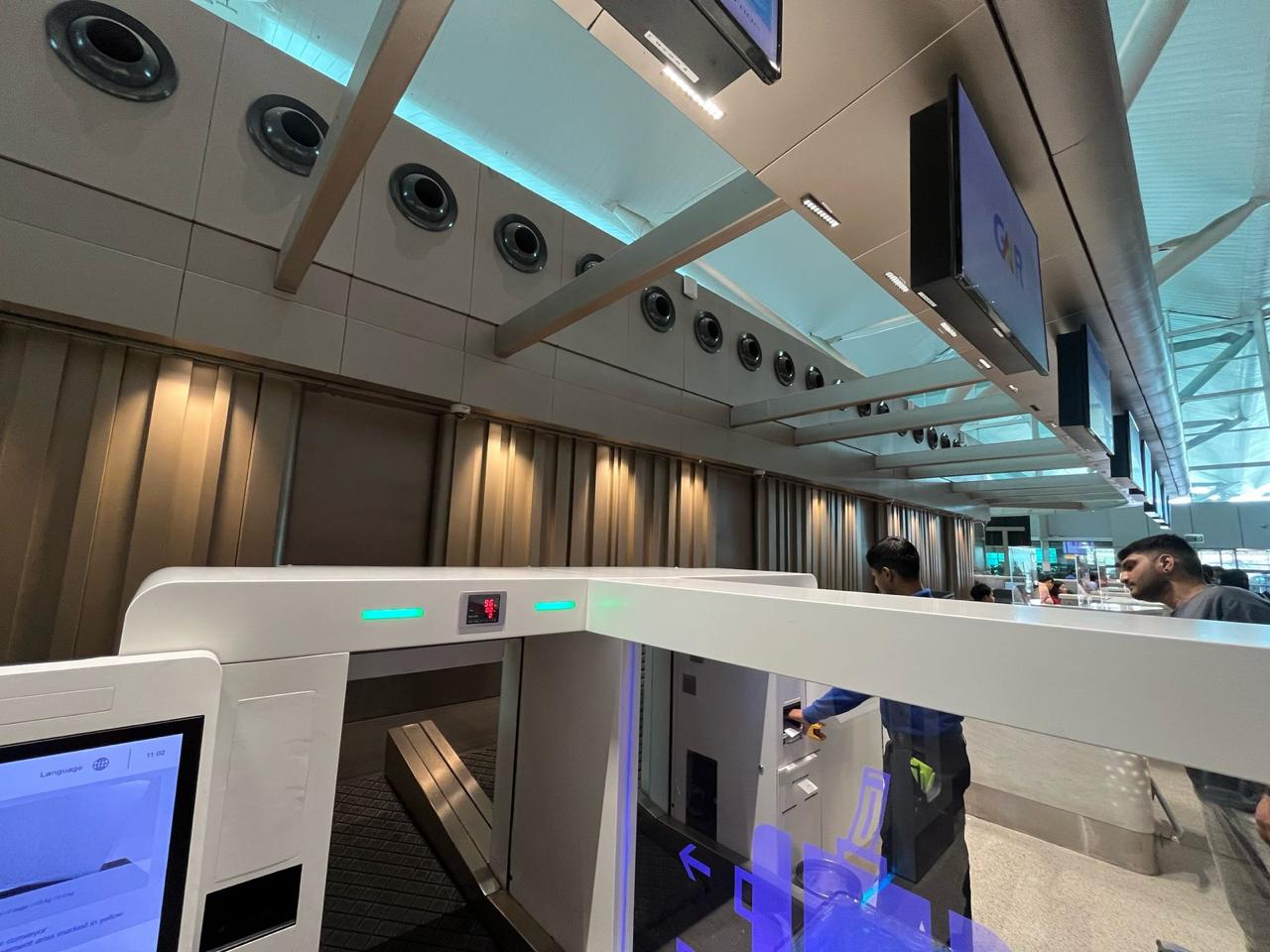 Rajiv Gandhi International Airport Hyderabad — linear ceiling execution.
